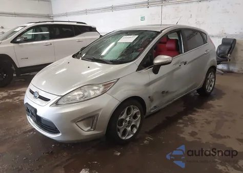 2013 Ford Fiesta Titanium z USA, uszkodzony, nr VIN 3FADP4FJXDM199751